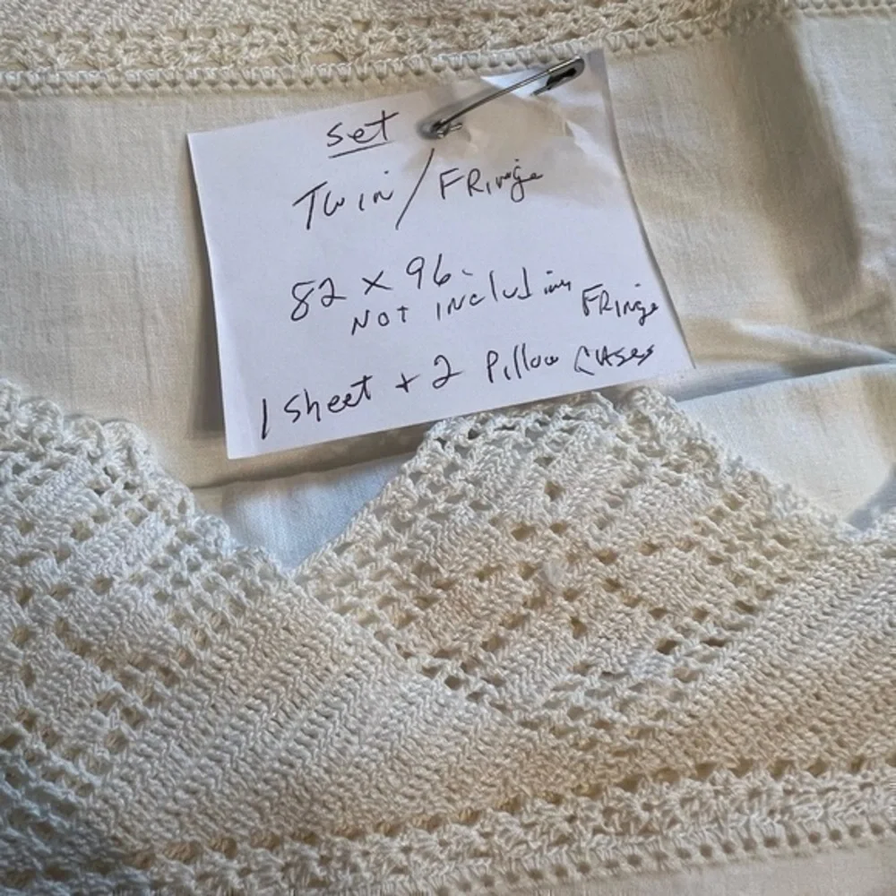 One vintage twin bed sheet w/two matching pillow cases. Never been used.